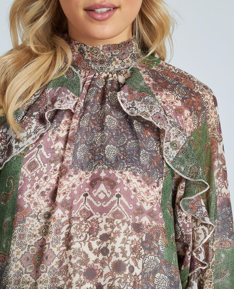 BLUSA ESTAMPADA VOLANTES