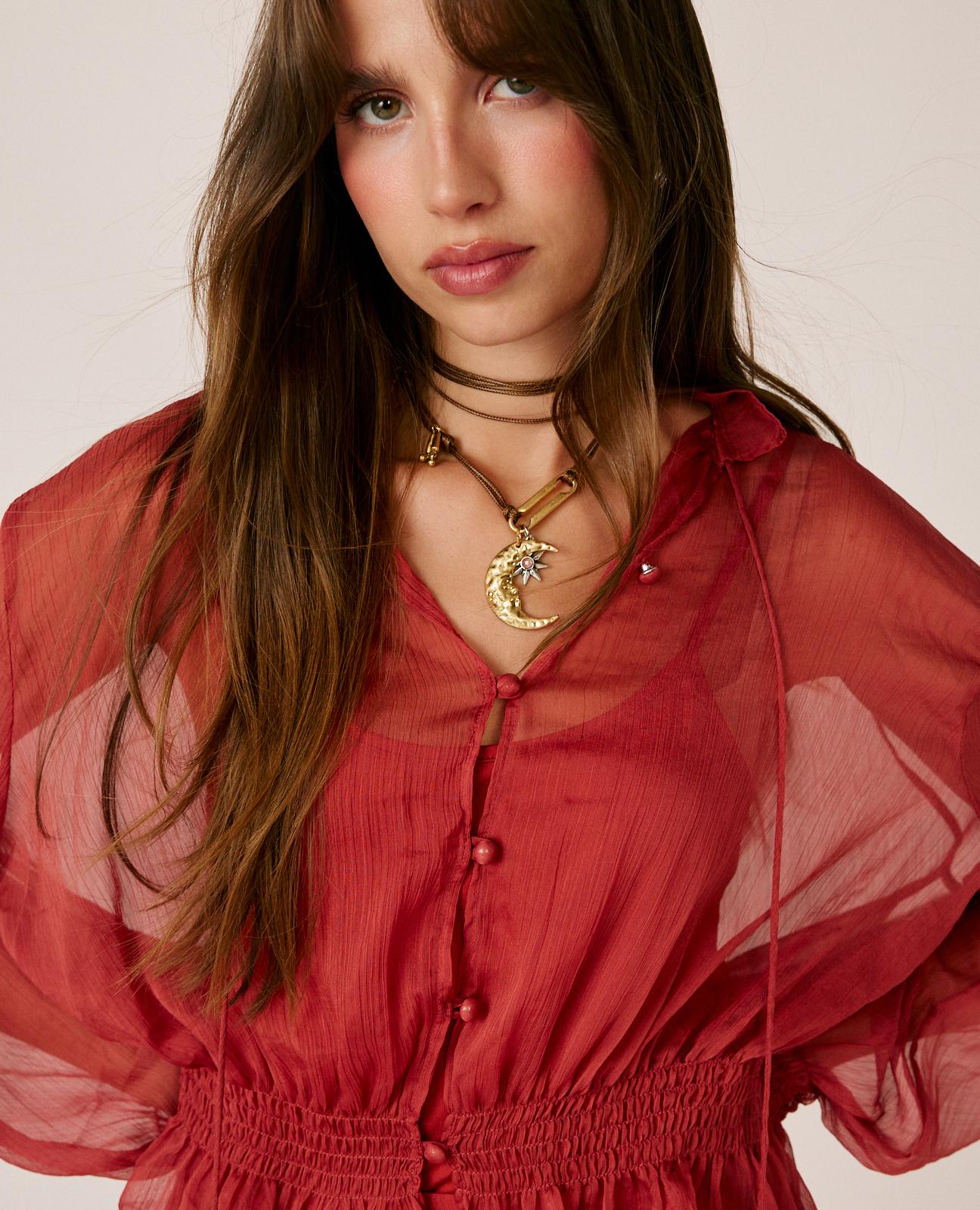 BLUSA DE GASA SEMITRANSPARENTE