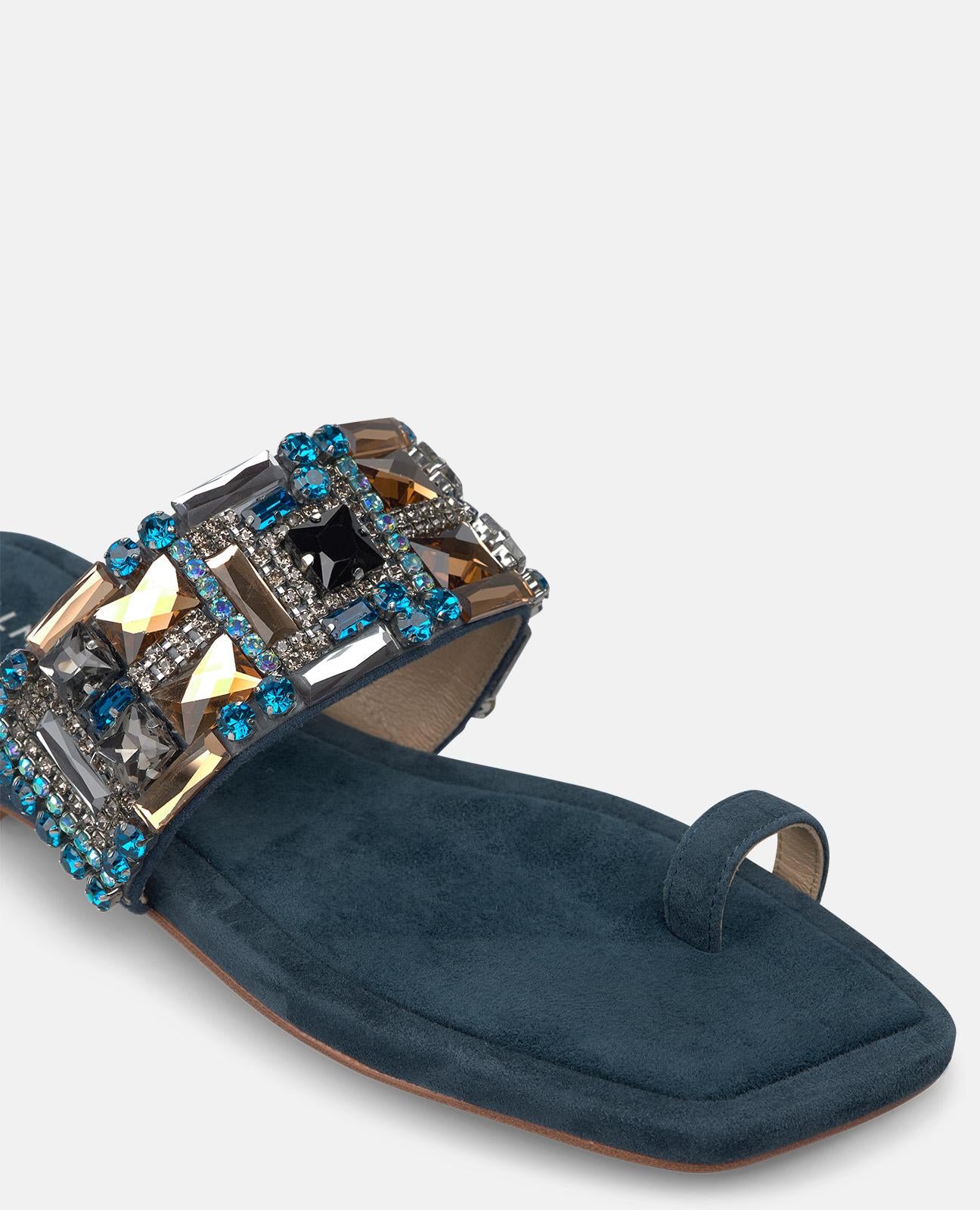 SANDALIA TIRA PEDRERIA PLANA