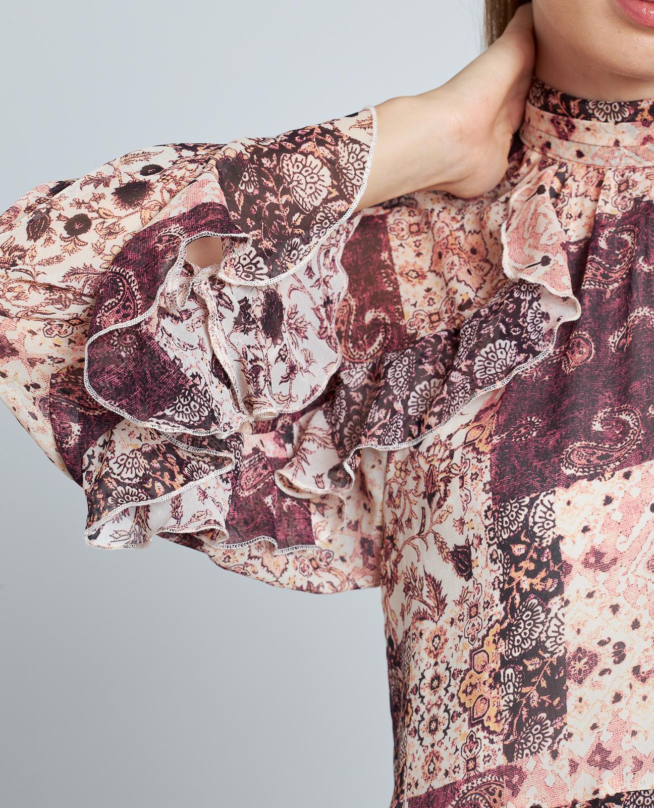 BLUSA ESTAMPADA VOLANTES