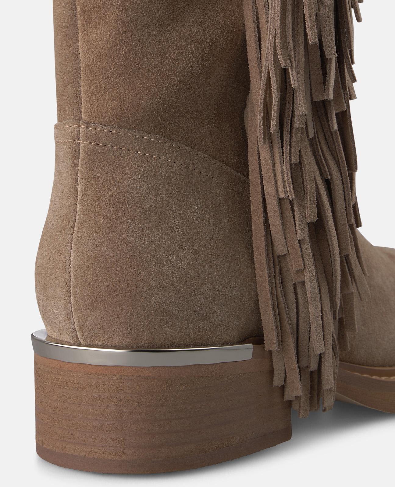 BOTA DE PIEL CON FLECOS