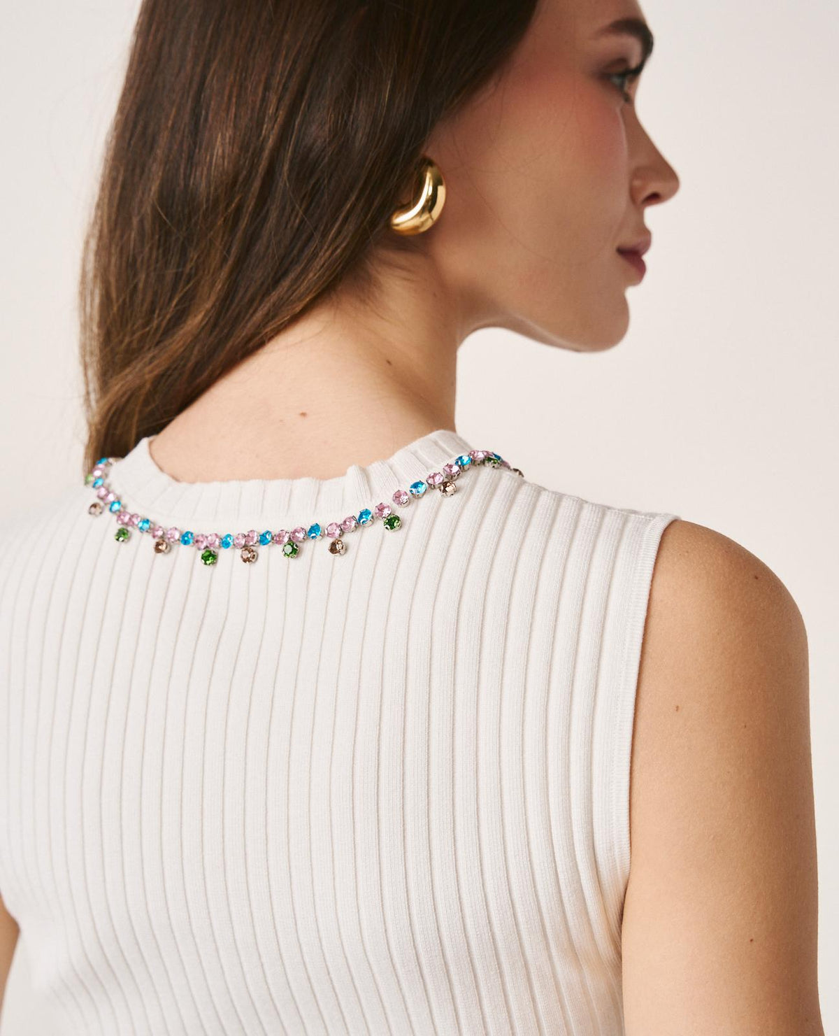 TOP COM CORTE PEPLUM