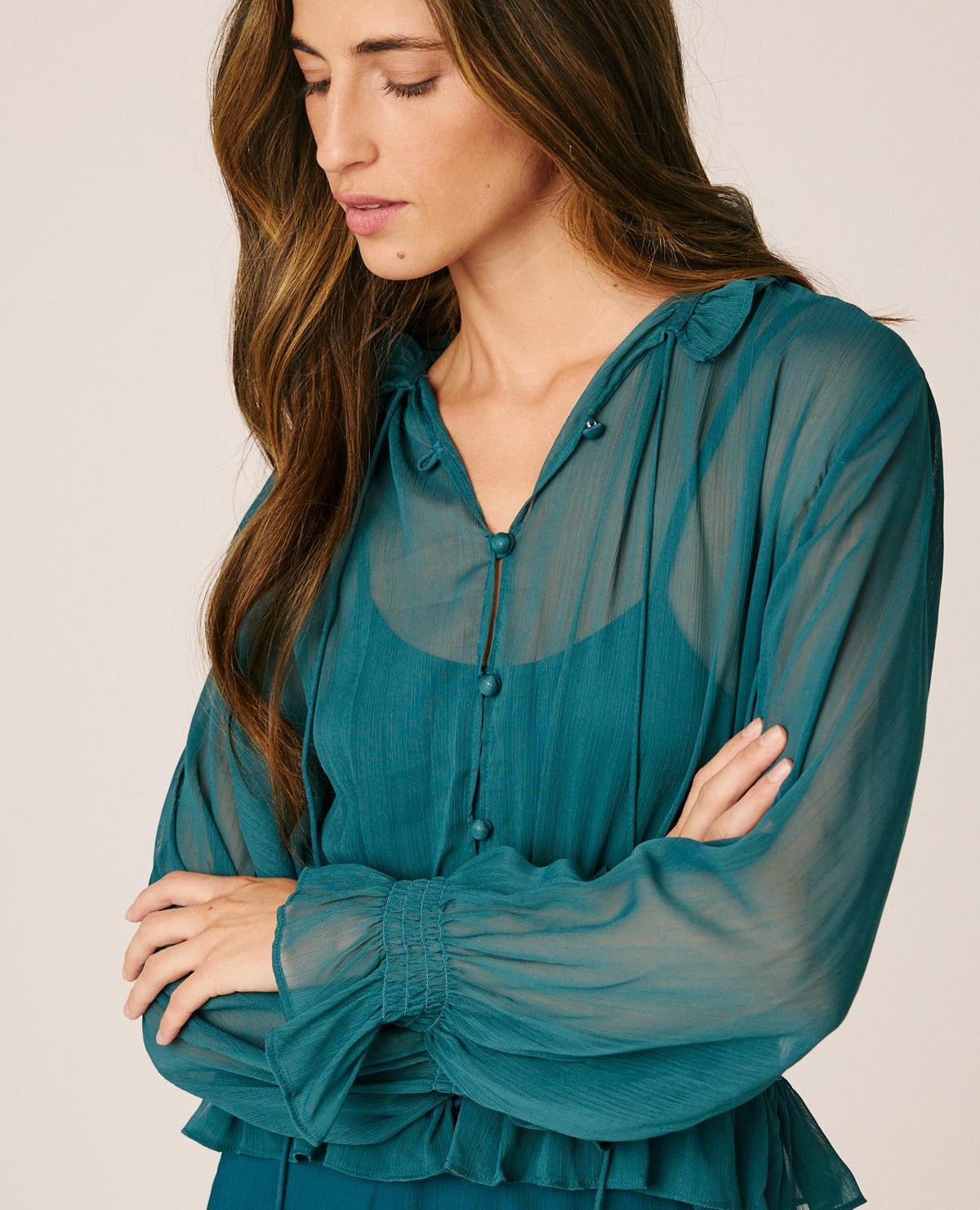 BLUSA SEMITRANSPARENTE VOLANTES