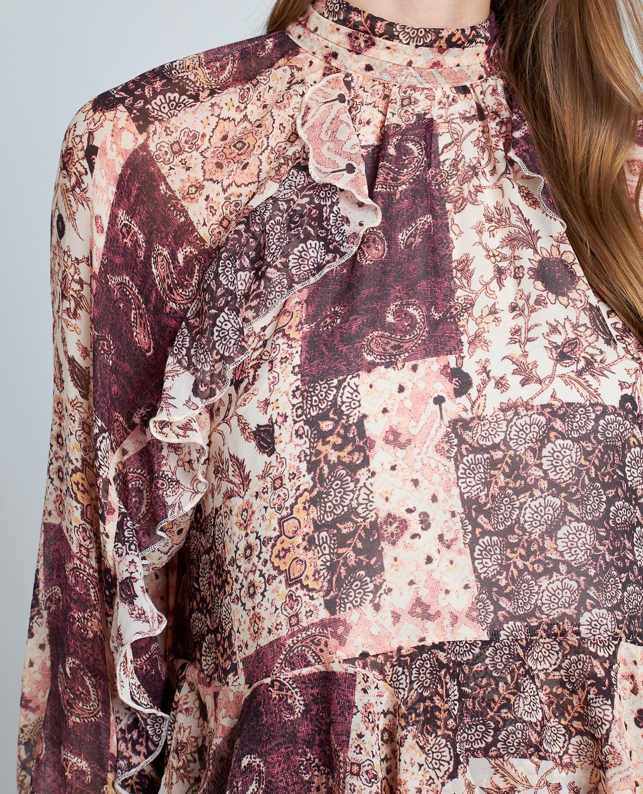 BLUSA ESTAMPADA VOLANTES