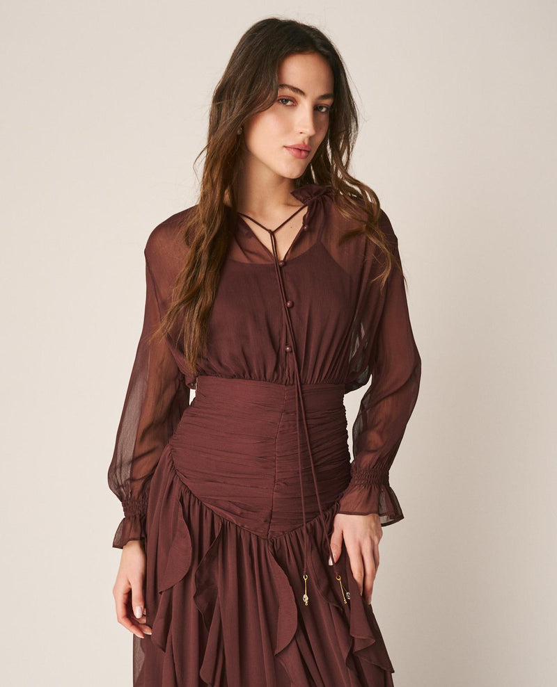 BLUSA SEMITRANSPARENTE VOLANTES