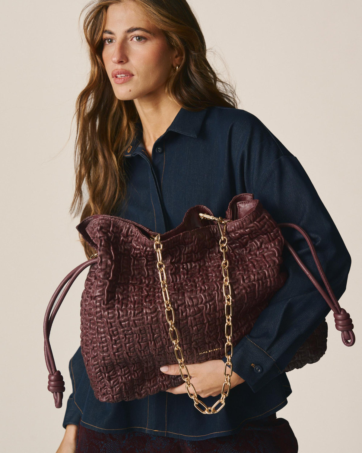 BORSA A FORMA DI CONFETTI IN PELLE STRUTTURATA