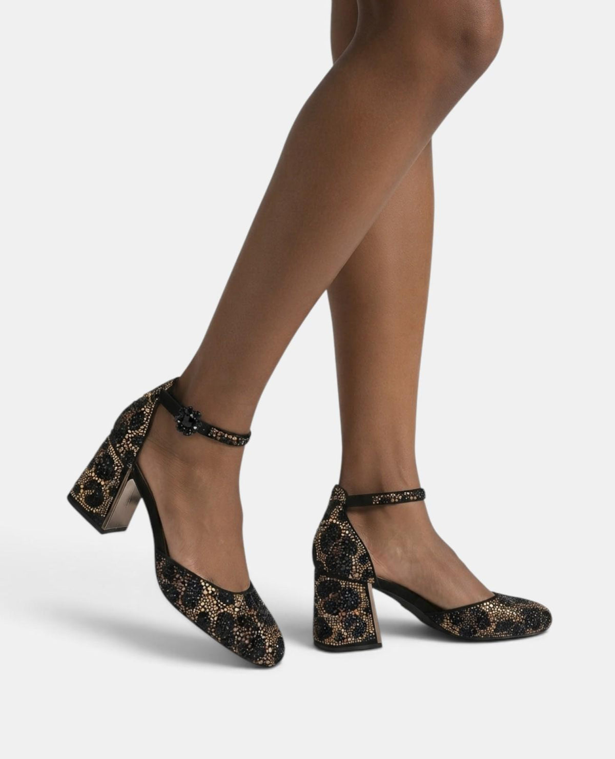 SCARPA CON TACCO E STAMPA ANIMAL PRINT CON CINTURINO