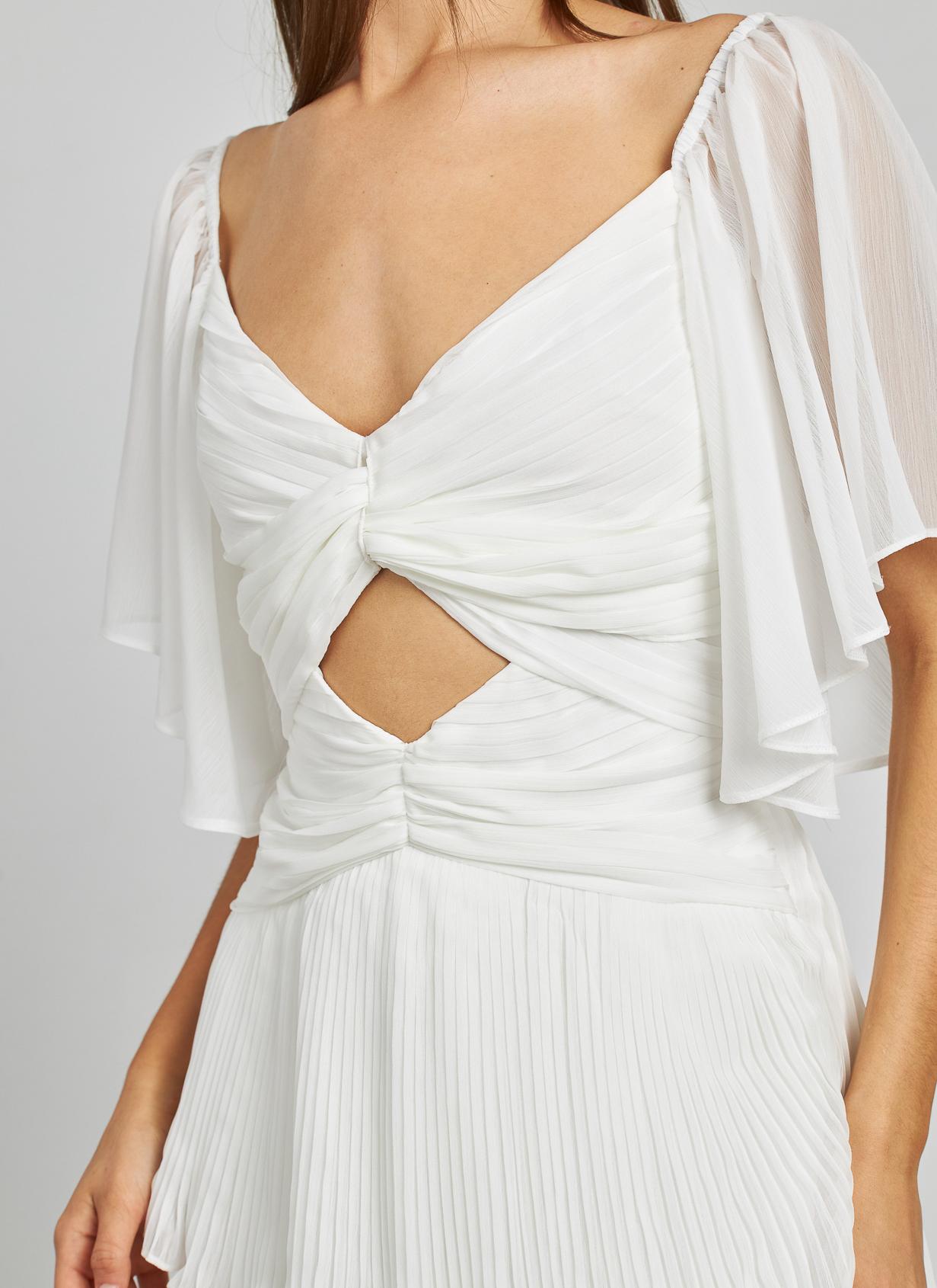 VESTIDO COM FOLHOS RECORTADOS