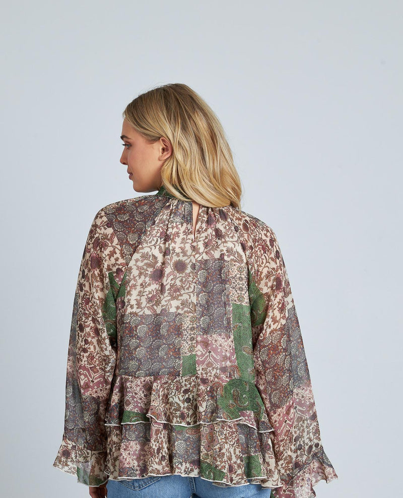 BLUSA ESTAMPADA VOLANTES