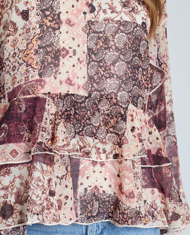 BLUSA ESTAMPADA VOLANTES