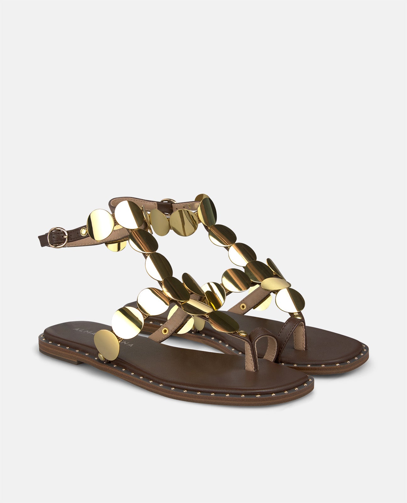 SANDÁLIA PLANA COM DETALHE DE CÍRCULOS