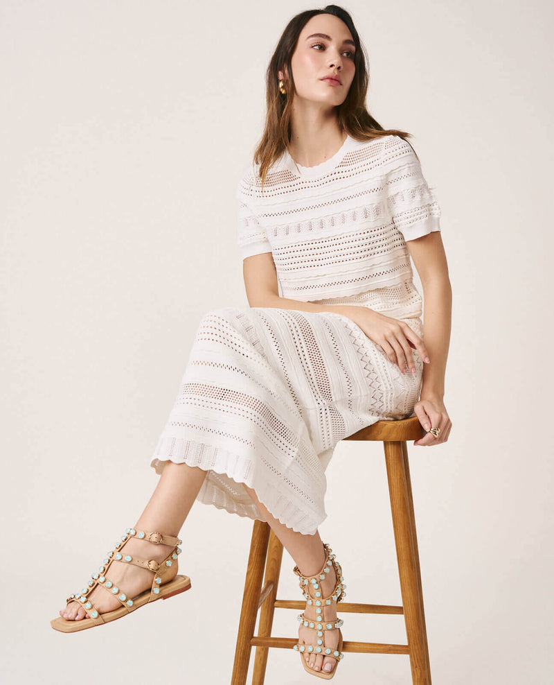 SANDALIA TIRAS TACHUELAS PLANA