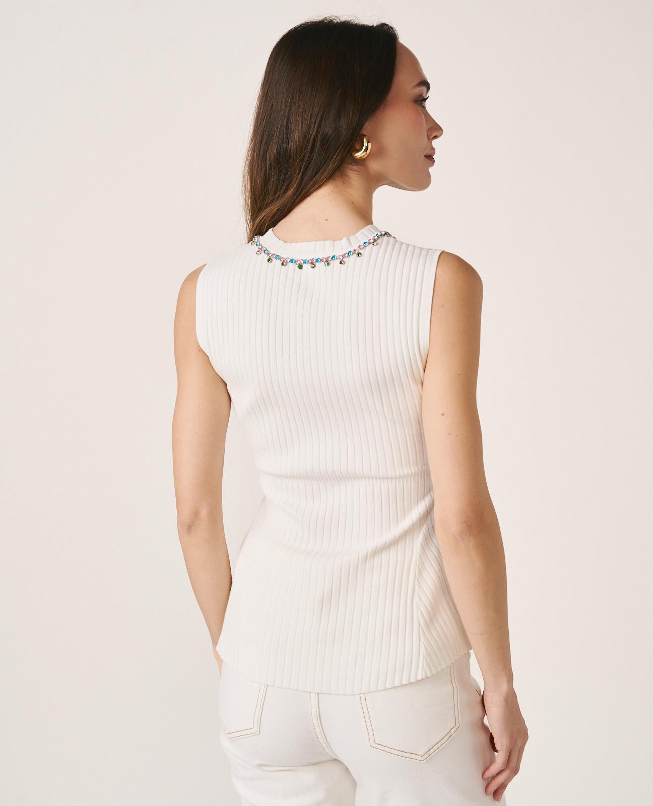 TOP COM CORTE PEPLUM