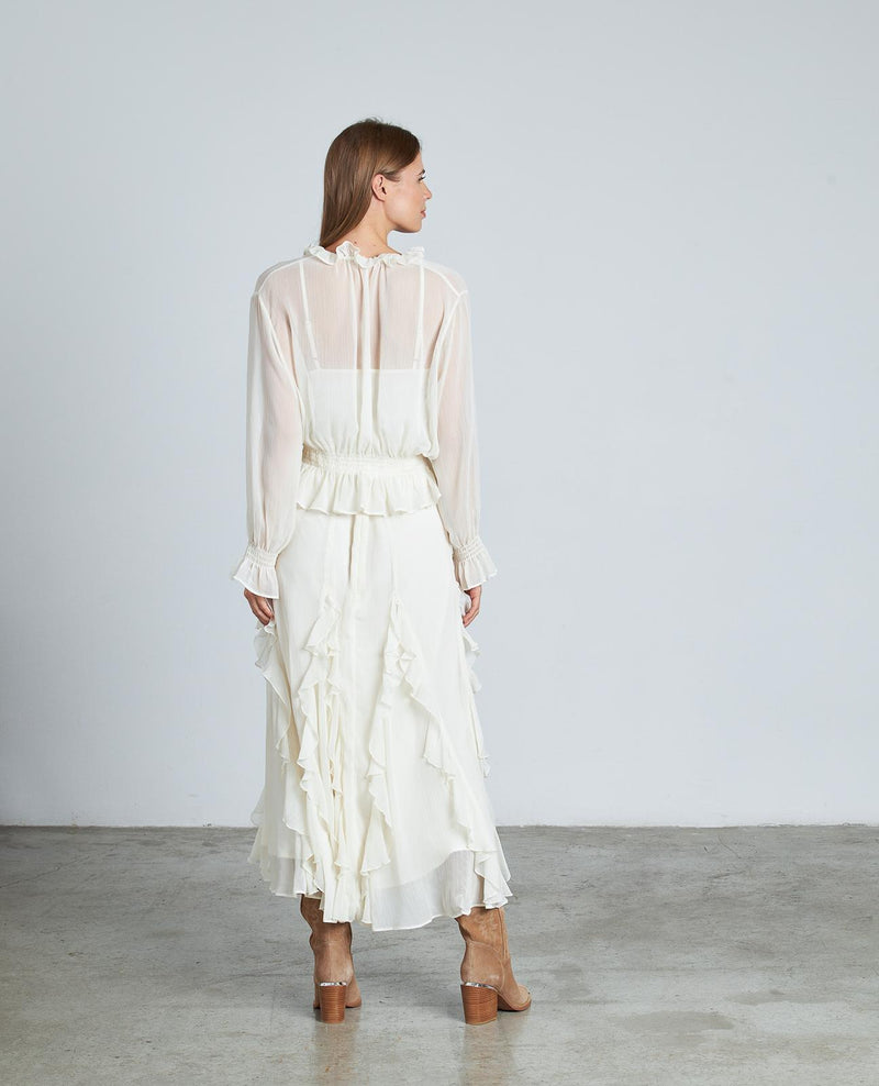 BLUSA SEMITRANSPARENTE VOLANTES